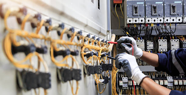 Professional Electrician technician working in Alpine, NJ